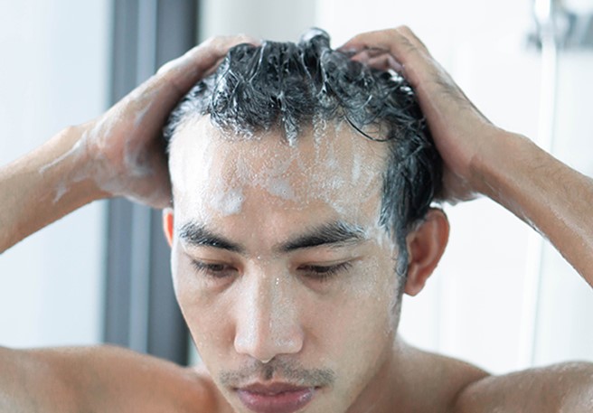 How does your hair care routine affect dandruff?